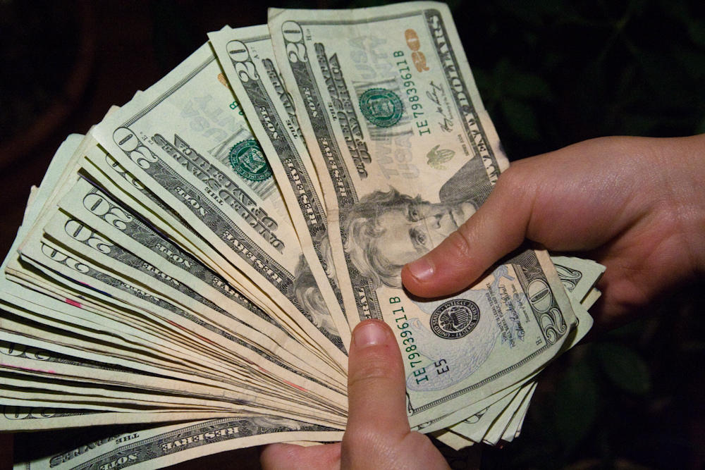 holding a lot of money