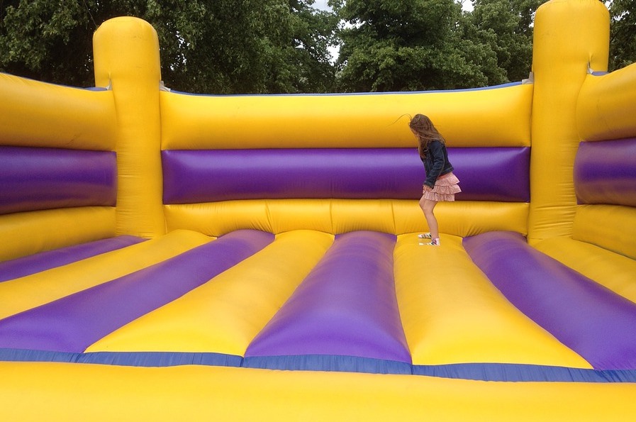 girl playing trampoline